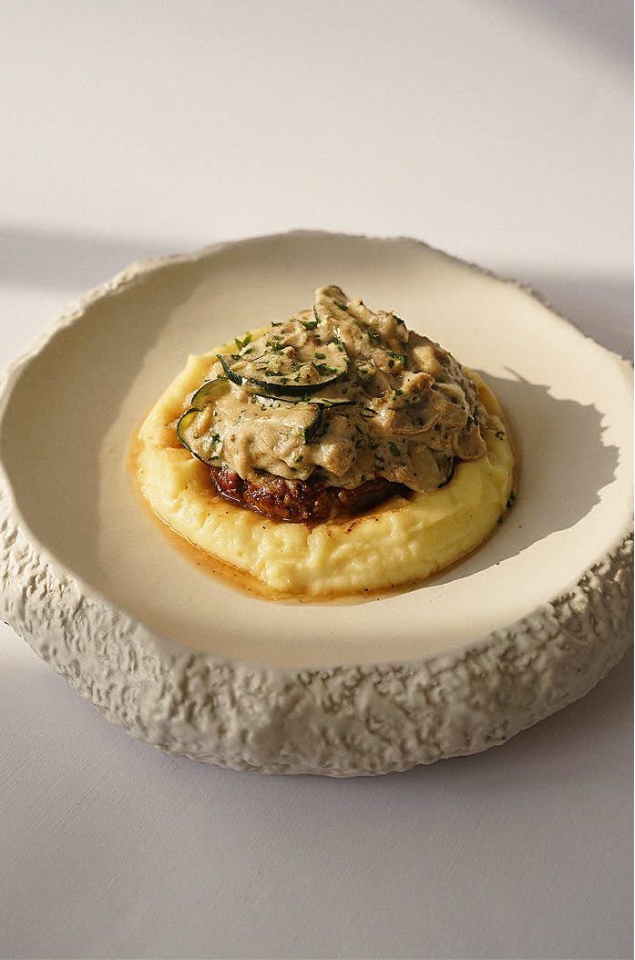Chicken patty with mashed potatoes & creamy mushroom sauce